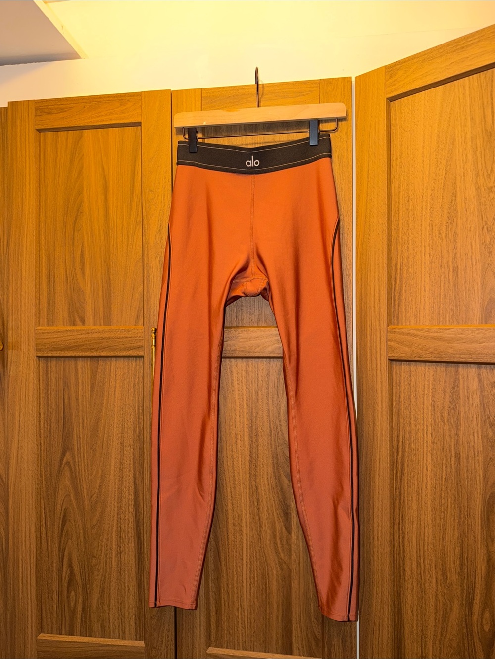 ALO Yoga Rust-Orange Leggings with Black Waistband